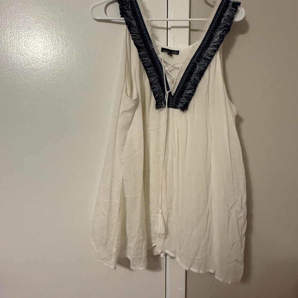 Elegant White Sleeveless Top with Navy Trim